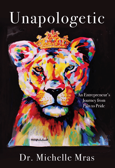 Book cover of Unapologetic by Dr.Michelle Mrs. Includes title and a colorful picture of a lion with a crown on it's head.